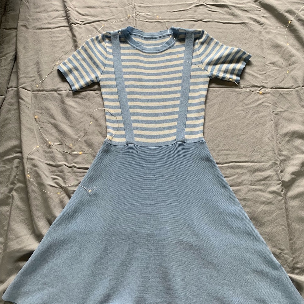 A Light Blue Pinstriped Dress with Suspenders